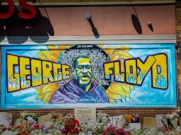 A mural stands in memoriam outside the Cup Foods convenience store in Minneapolis near where George Floyd was murdered by police May 25, 2020. The area is now known as George Floyd Square.