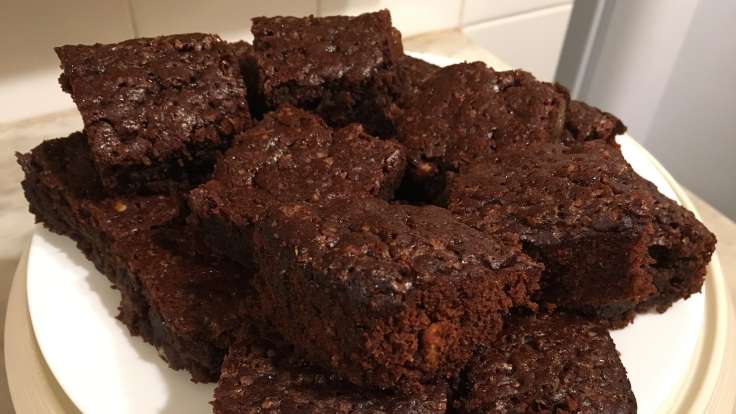 Chocolate brownies on a white plate