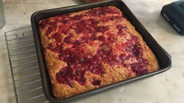 Cake with fruity topping in tin