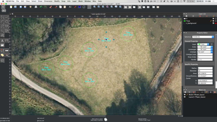 Screenshot of CAD program with large scale satellite photo in background and circles for trees