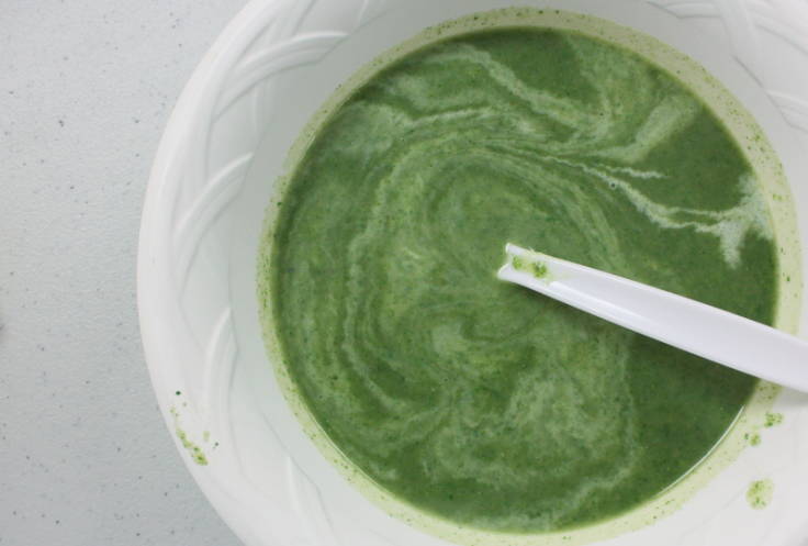 Bowl of nettle soup with creme fraiche