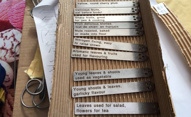 Metal labels in brown packaging