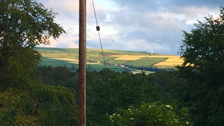 View of recently shaved fields across the valley