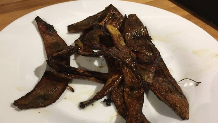 Charred brown banana skins. But think of them as vegan bacon.