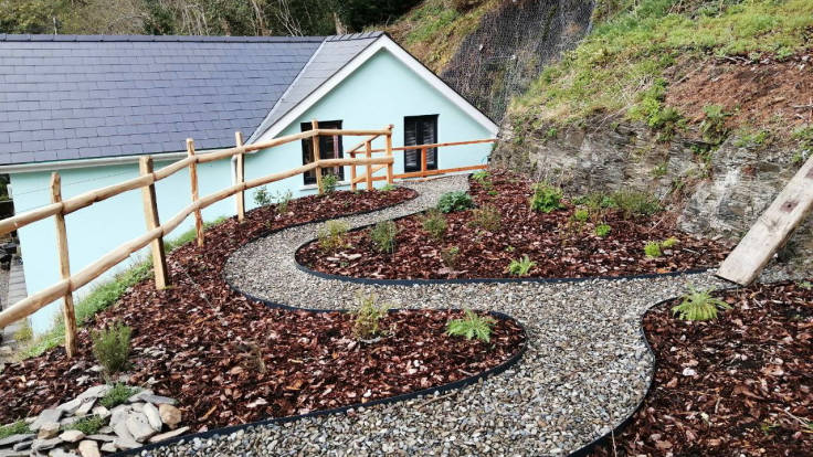 High garden, fenced, curvey path, new beds