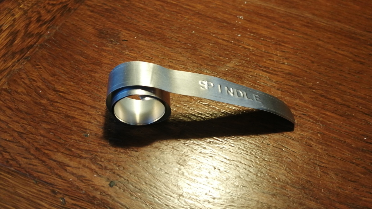 Curled metal embossed plant label