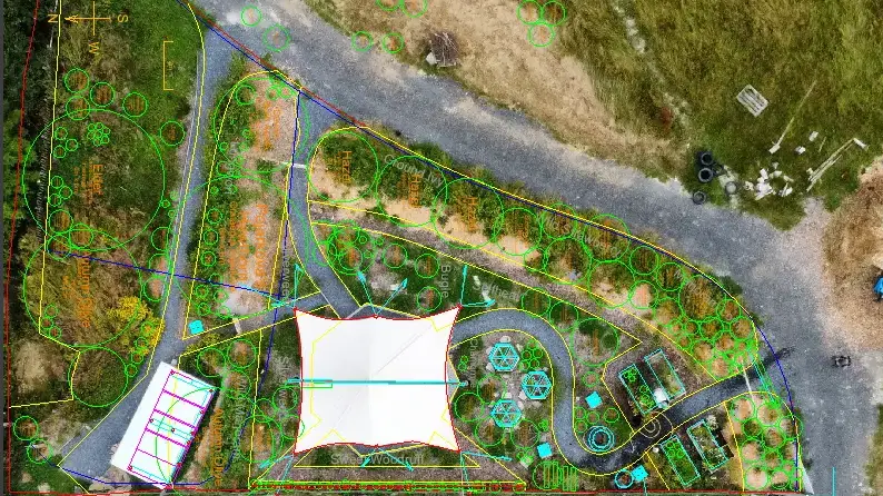 CAD garden plan with drone background