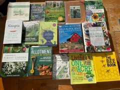 15 forest garden books laid out on the floor