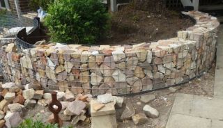 Circular stone filled gabion