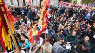 Extinction Rebellion protestors on the ground