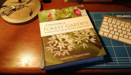Creating a Forest Garden book on desk