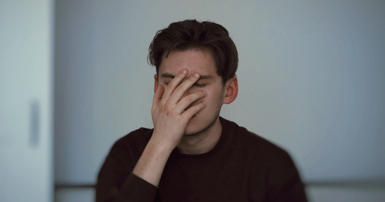 dad with head in hands