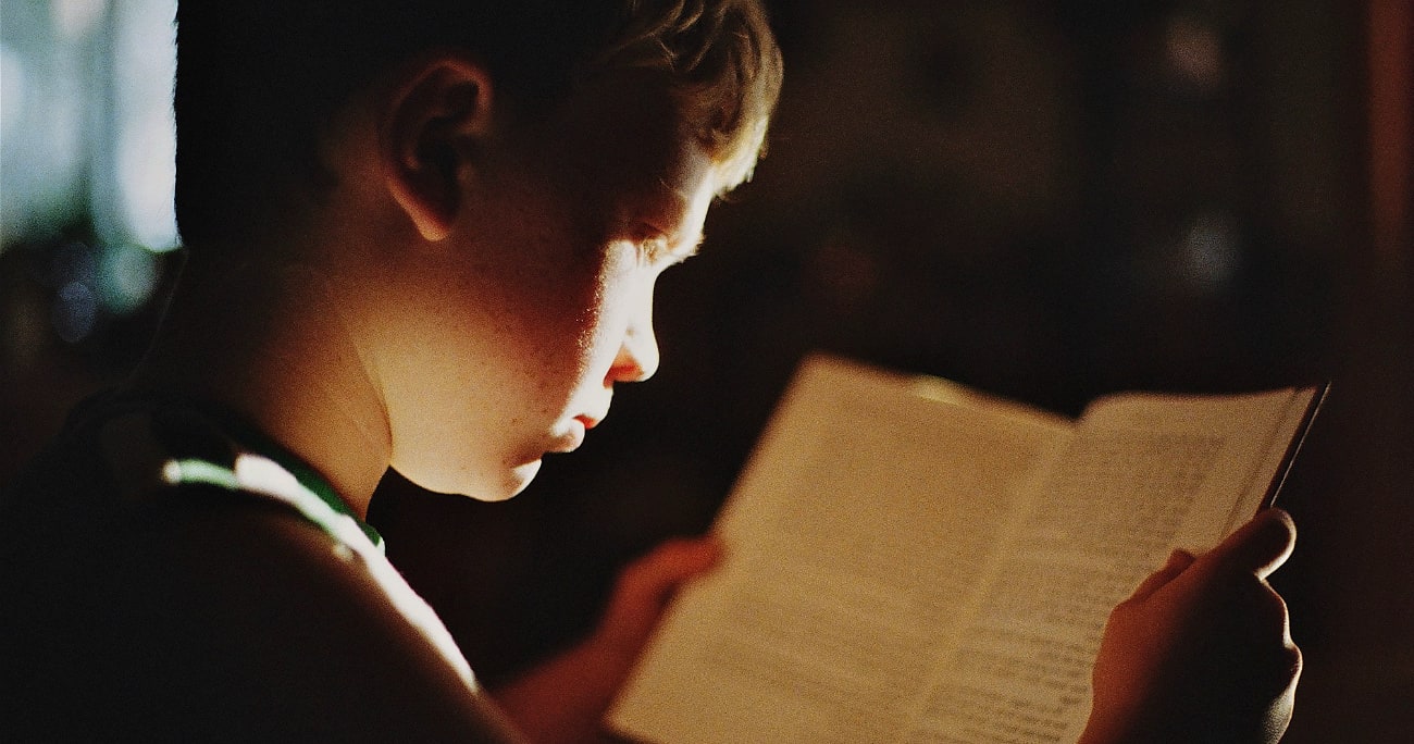 dad reading to a young child