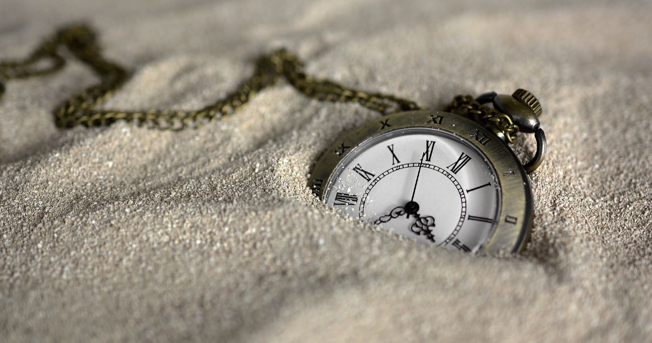 pocket watch in the sand