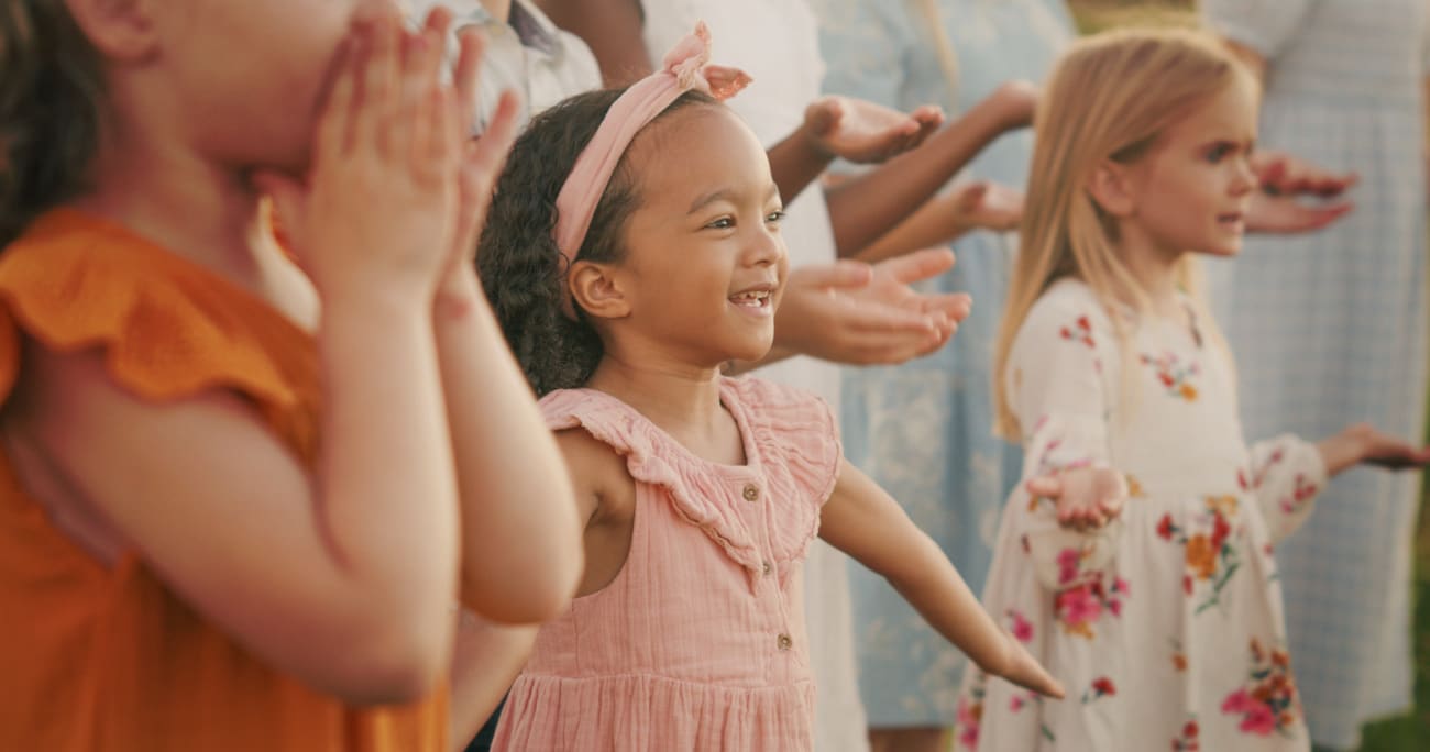 children singing and smiling