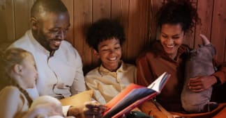 Family reading the Bible together
