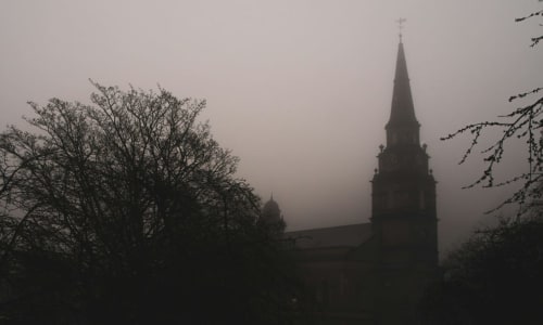 church steeple in the fog