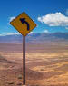 turn left road sign in a desert