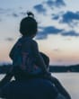 dad with child supporting art message | Brittani Burns, via Unsplash
