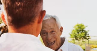 grandfather and son talking