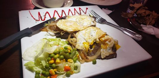 restaurant on johnson Caridad & Louie's Restaurant logo