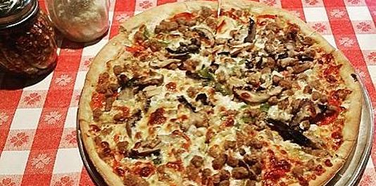 ghost toast the witching hour Bariola's Pizza logo