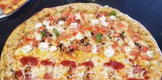 toms house of pizza near me
