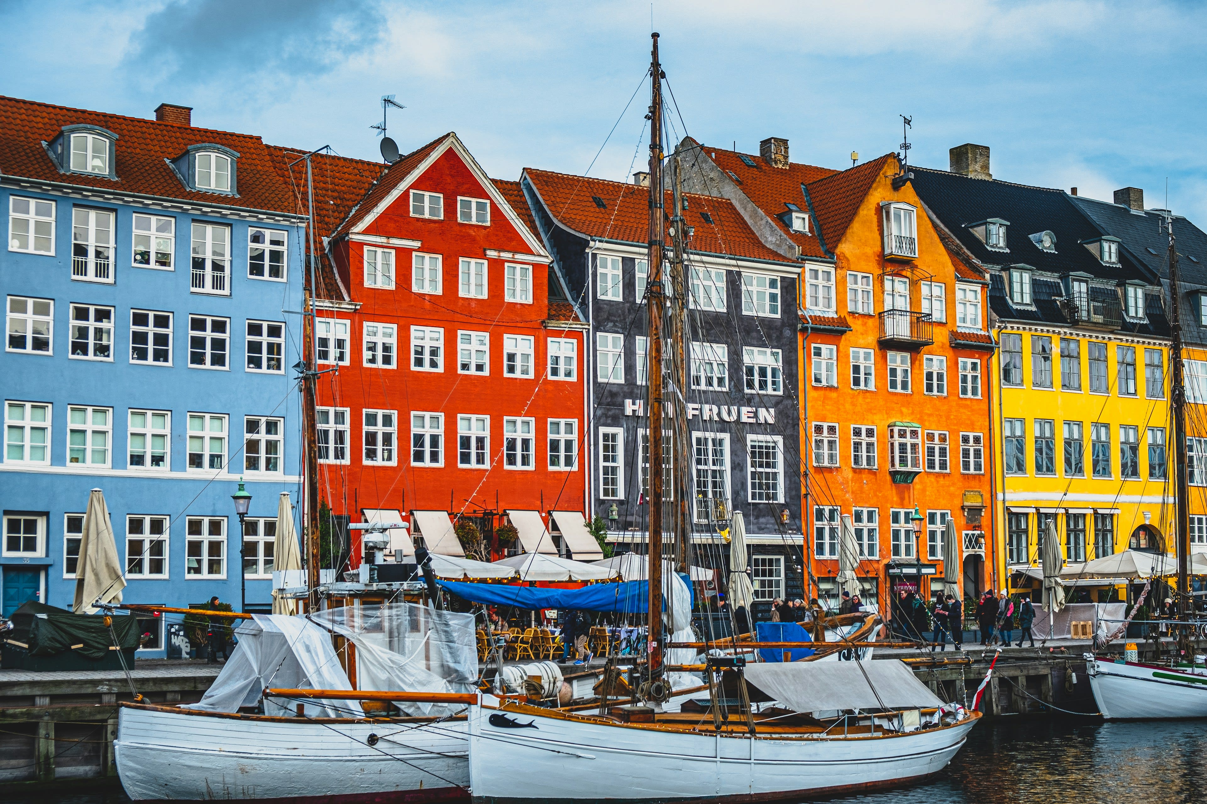 Colourful old townhouses and moored boats along the Nyhavn canal