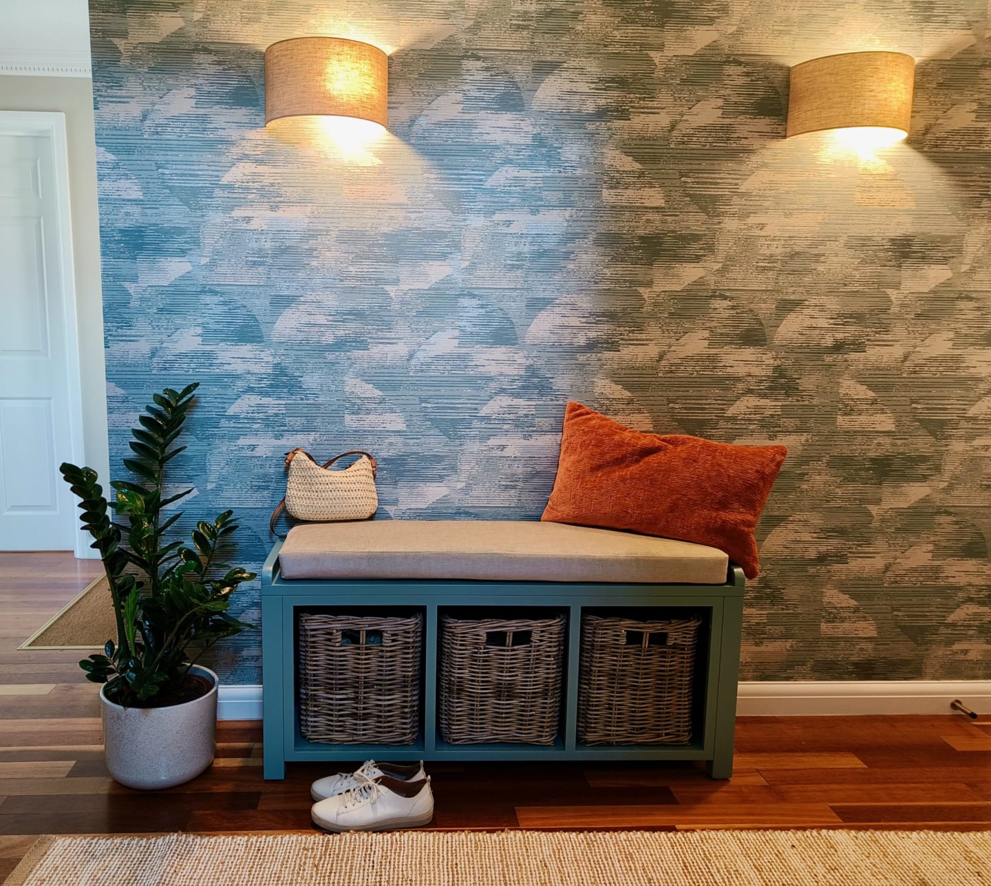Textured blue wallpaper in calming hallway