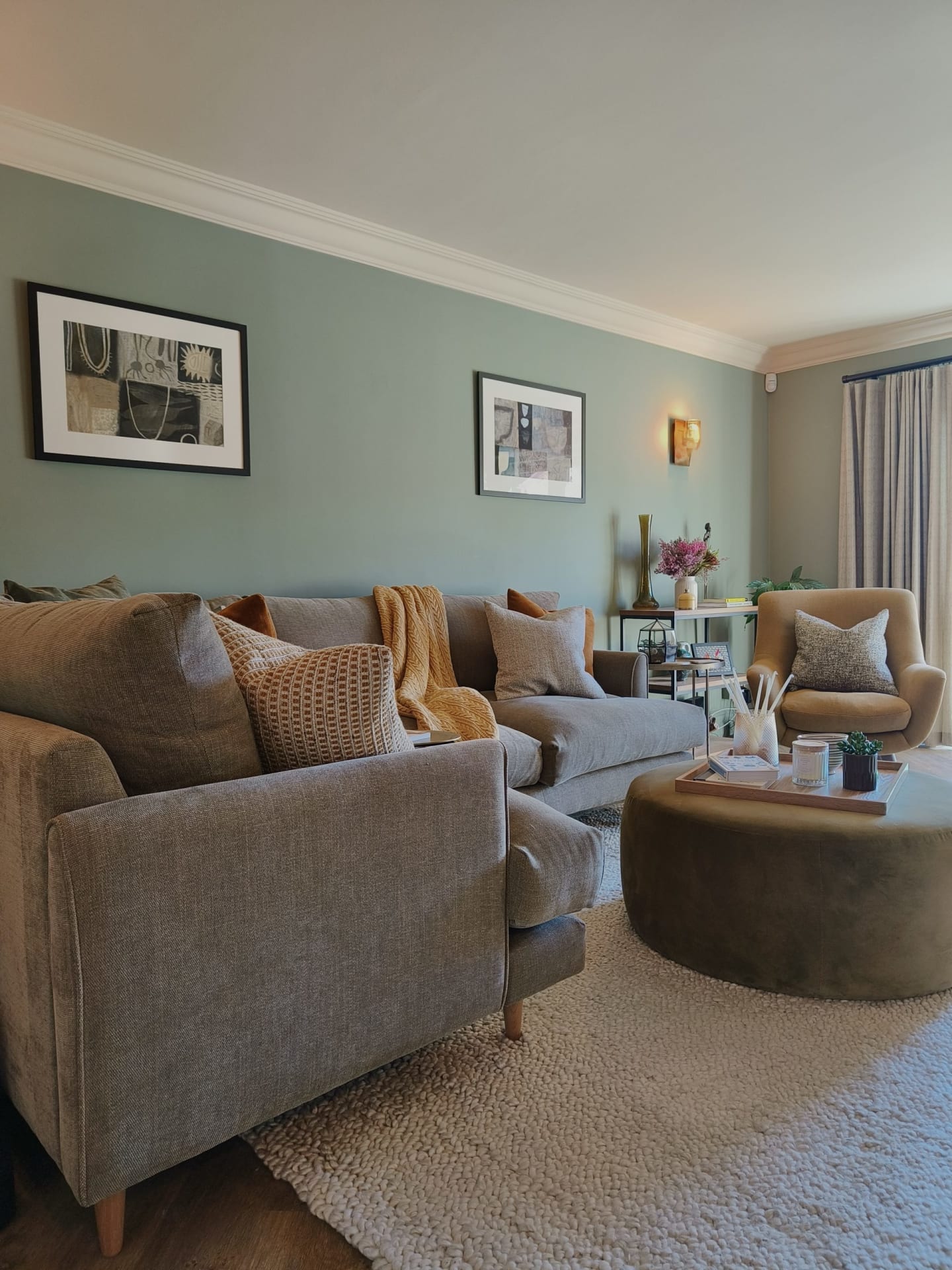 Olive living room with olive sofa and footstool