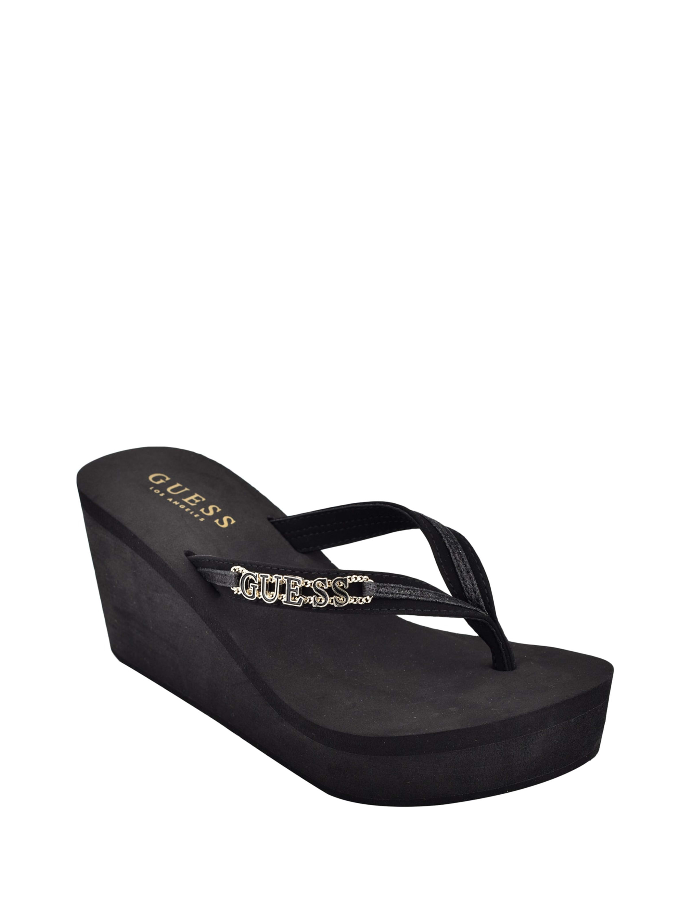 guess flip flops with charms