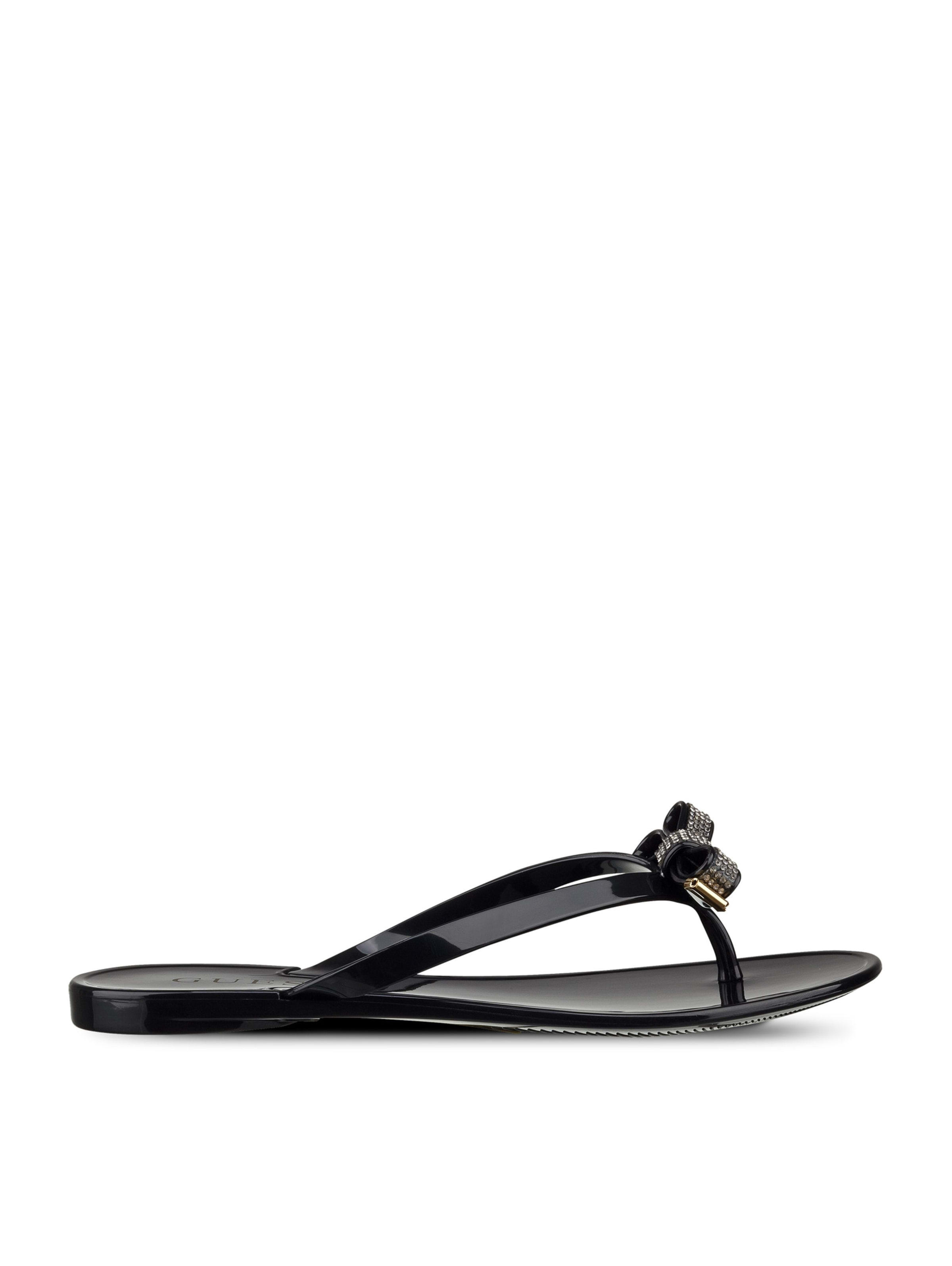 guess white flip flops