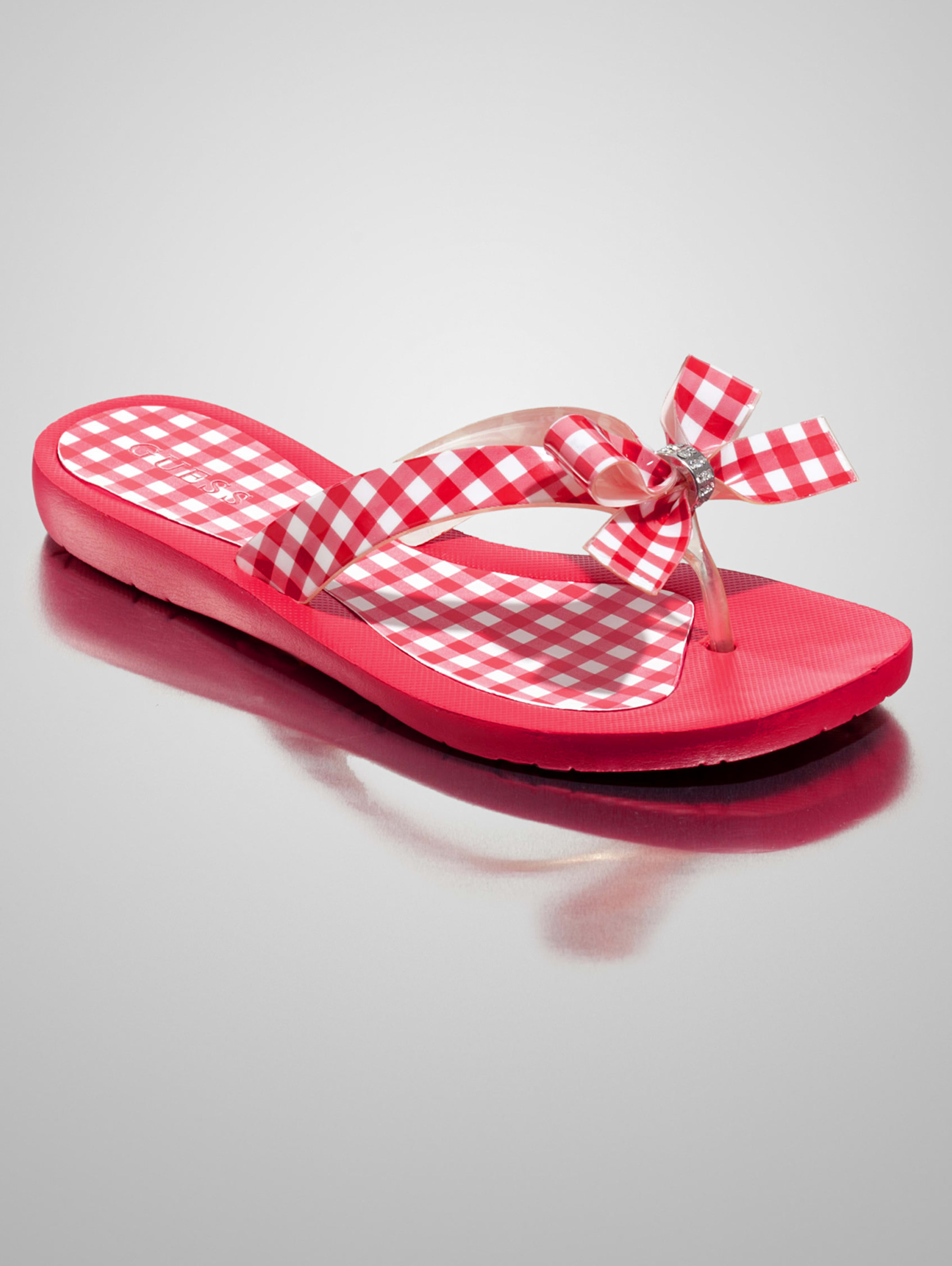 red guess flip flops