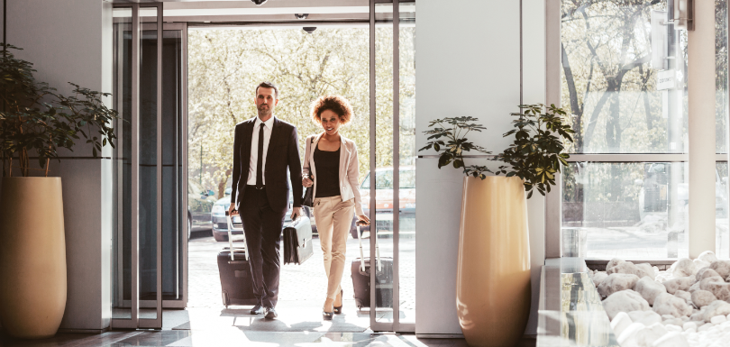 Guests walking through hotel entry