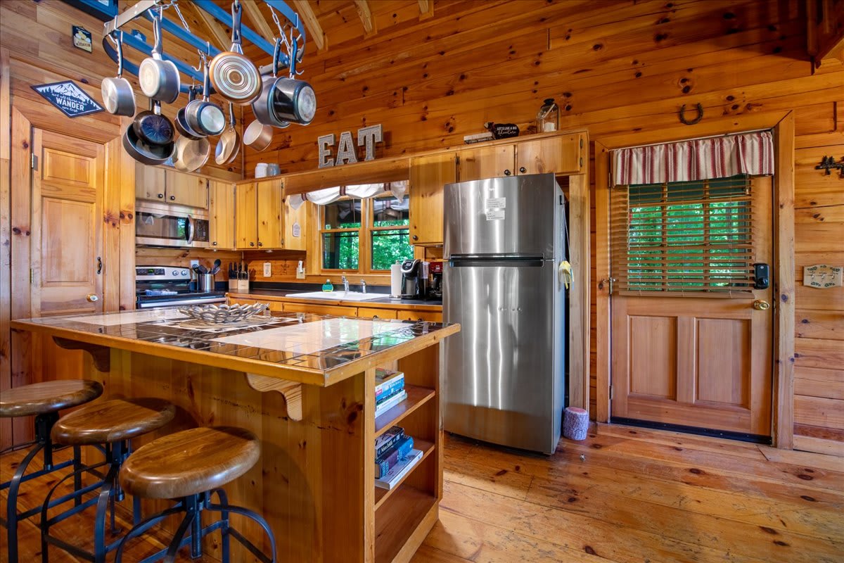 Hilltop Hideaway Charming Cabin with Hot tub | Photo 3