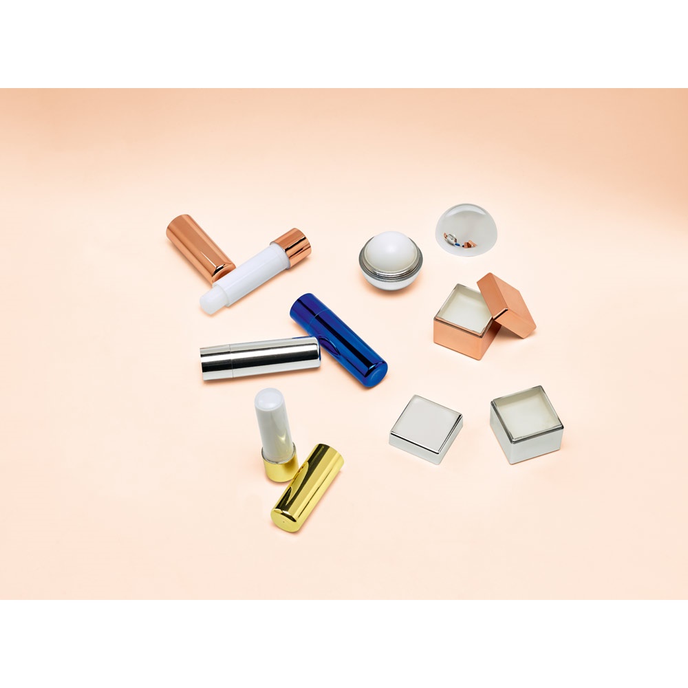 ALBA. Protector labial suministrado en un envase de ABS
