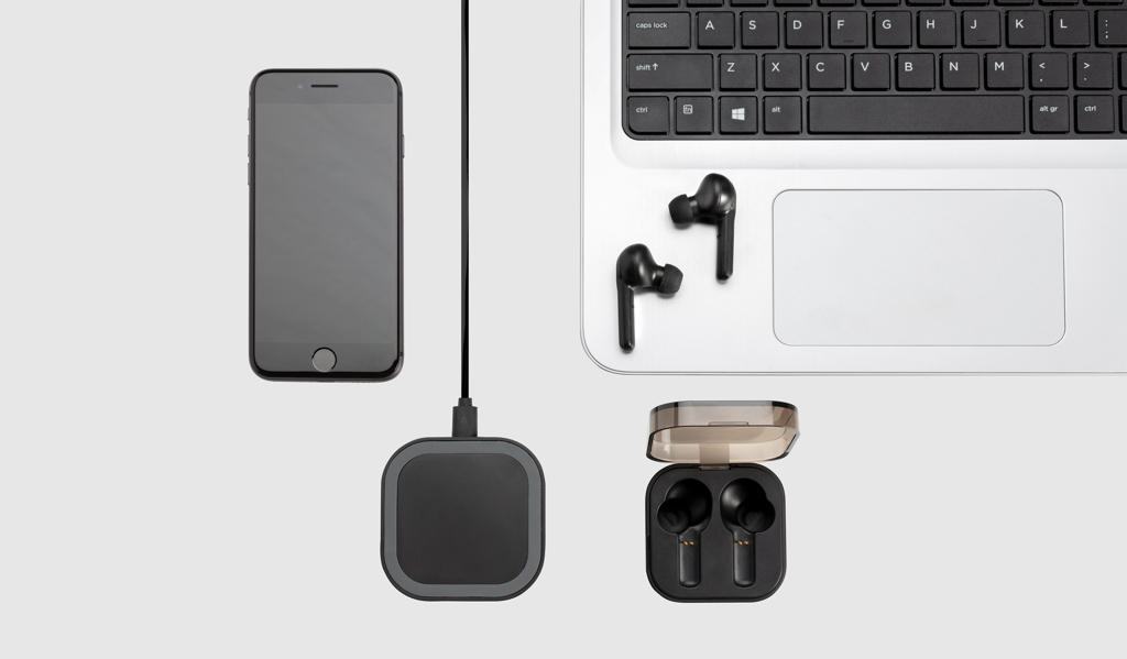 Auriculares TWS en caja de carga inalámbrica