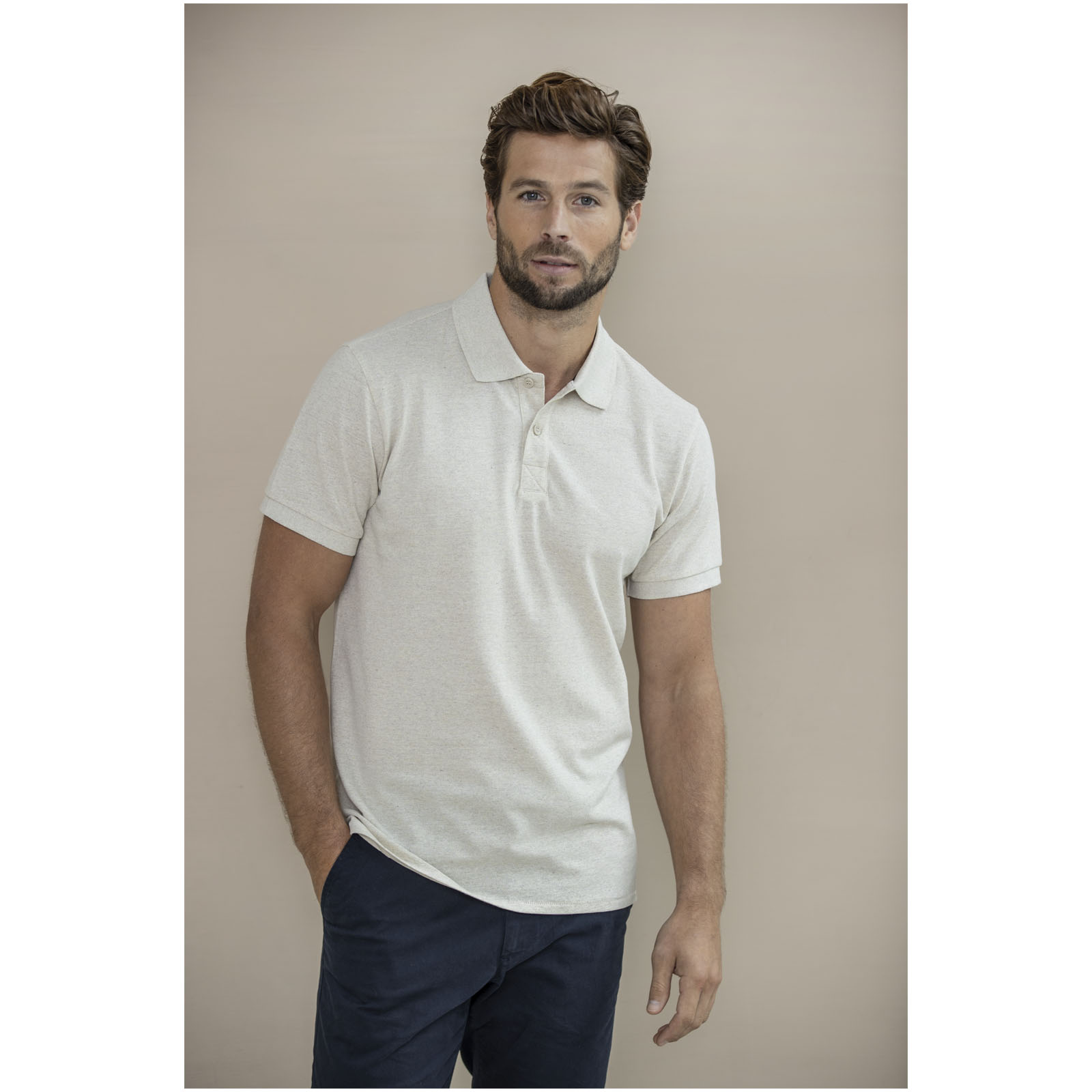Polo de manga corta unisex con material reciclado Aware™ Emerald