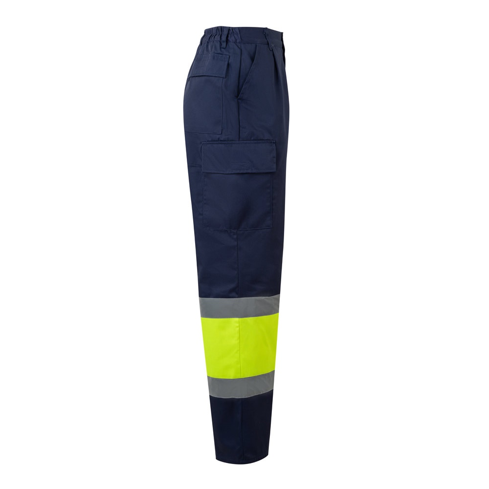 VL ARTEMIS. Pantalón bicolor, en sarga (190 g/m²), algodón (20 %) y poliéster (80 %). Pantalón multibolsillos elástico (240 g/m²), en algodón (46%), EME (38%) y poliéster (16%)