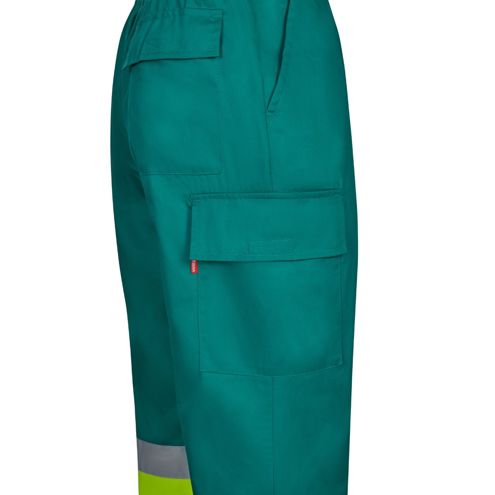 VL ARTEMIS. Pantalón bicolor, en sarga (190 g/m²), algodón (20 %) y poliéster (80 %). Pantalón multibolsillos elástico (240 g/m²), en algodón (46%), EME (38%) y poliéster (16%)
