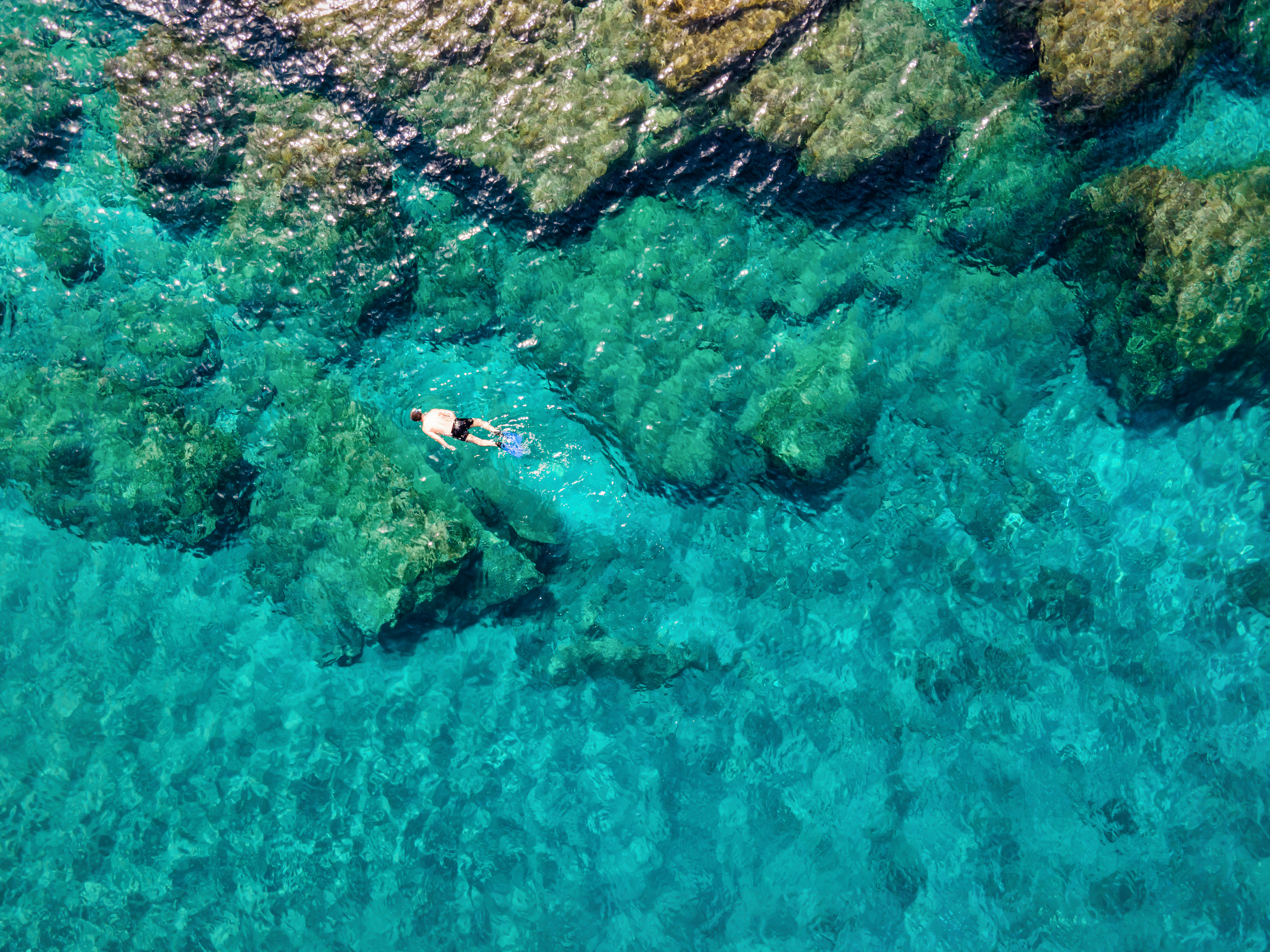 Snorkel and swim in crystal-clear Mediterranean waters