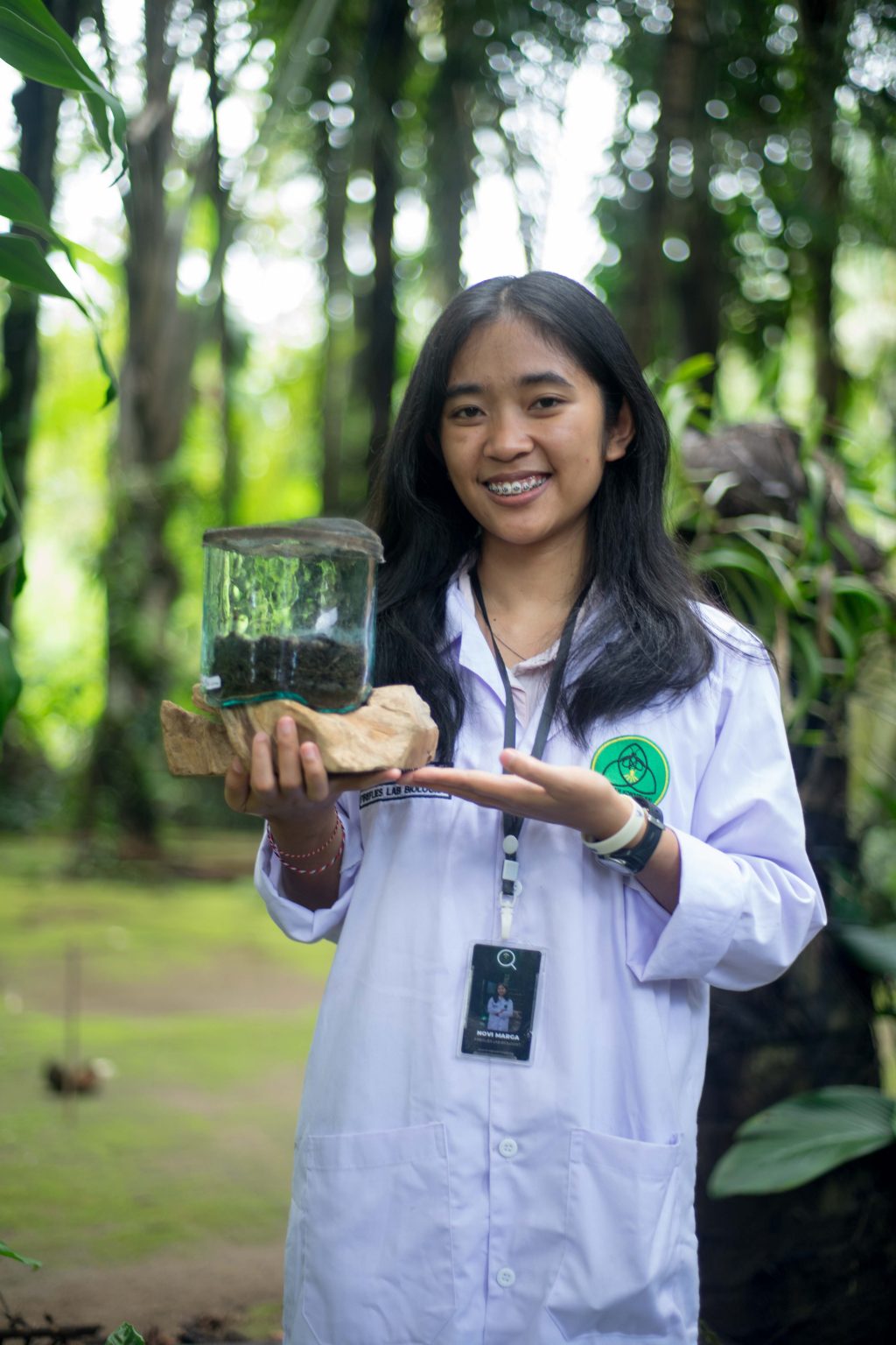 Visit a firefly conservation project and a quieter local temple near Ubud.