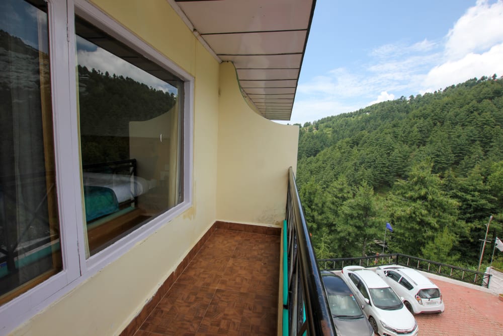 View of the Himalayan range from a balcony at Hilltop Resort Narkanda