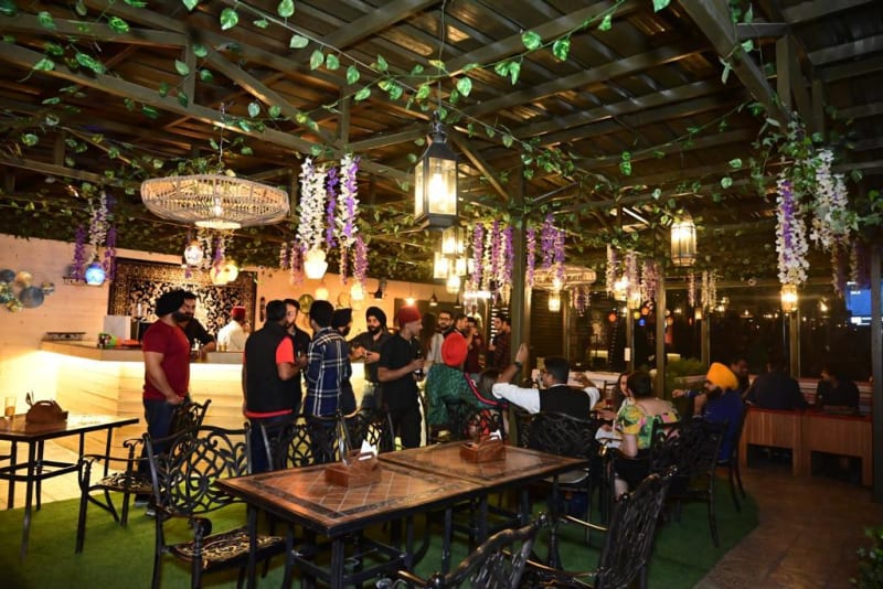 Guests dining in the covered restaurant