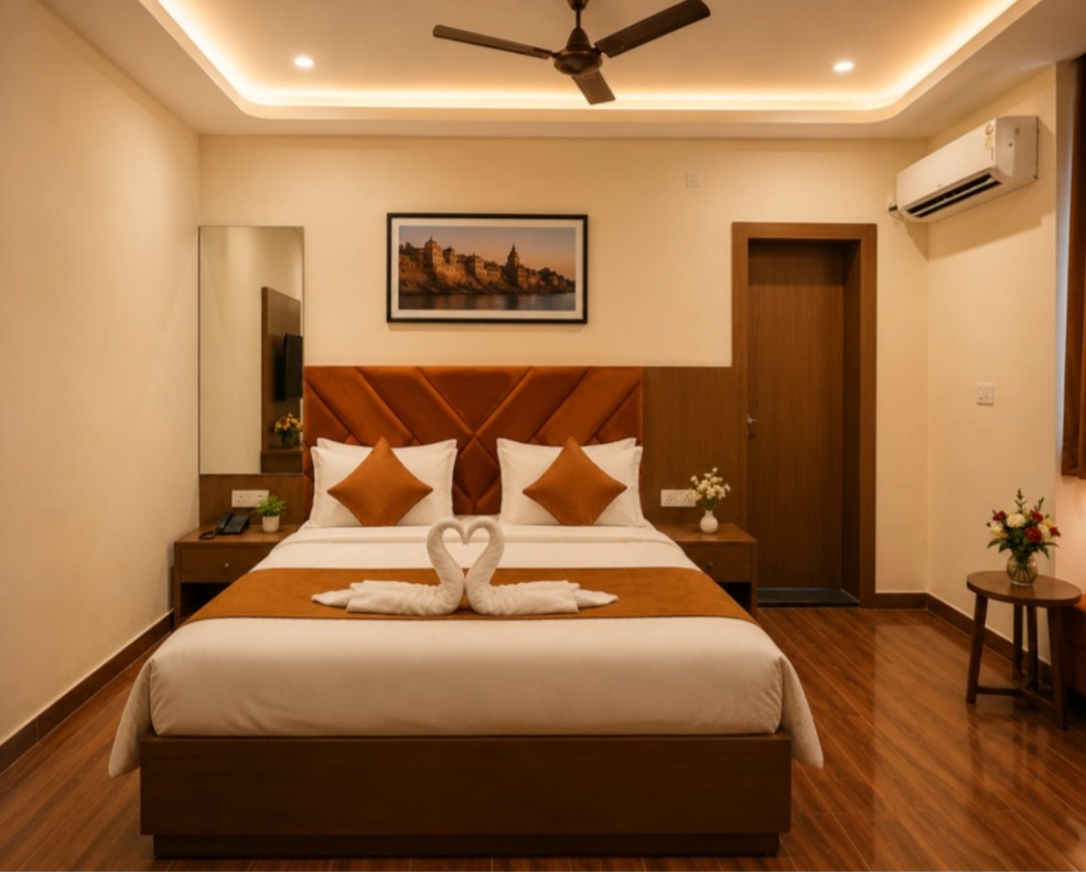 Room with king bed, wooden flooring and air-conditioning at Hotel Grand Lucent