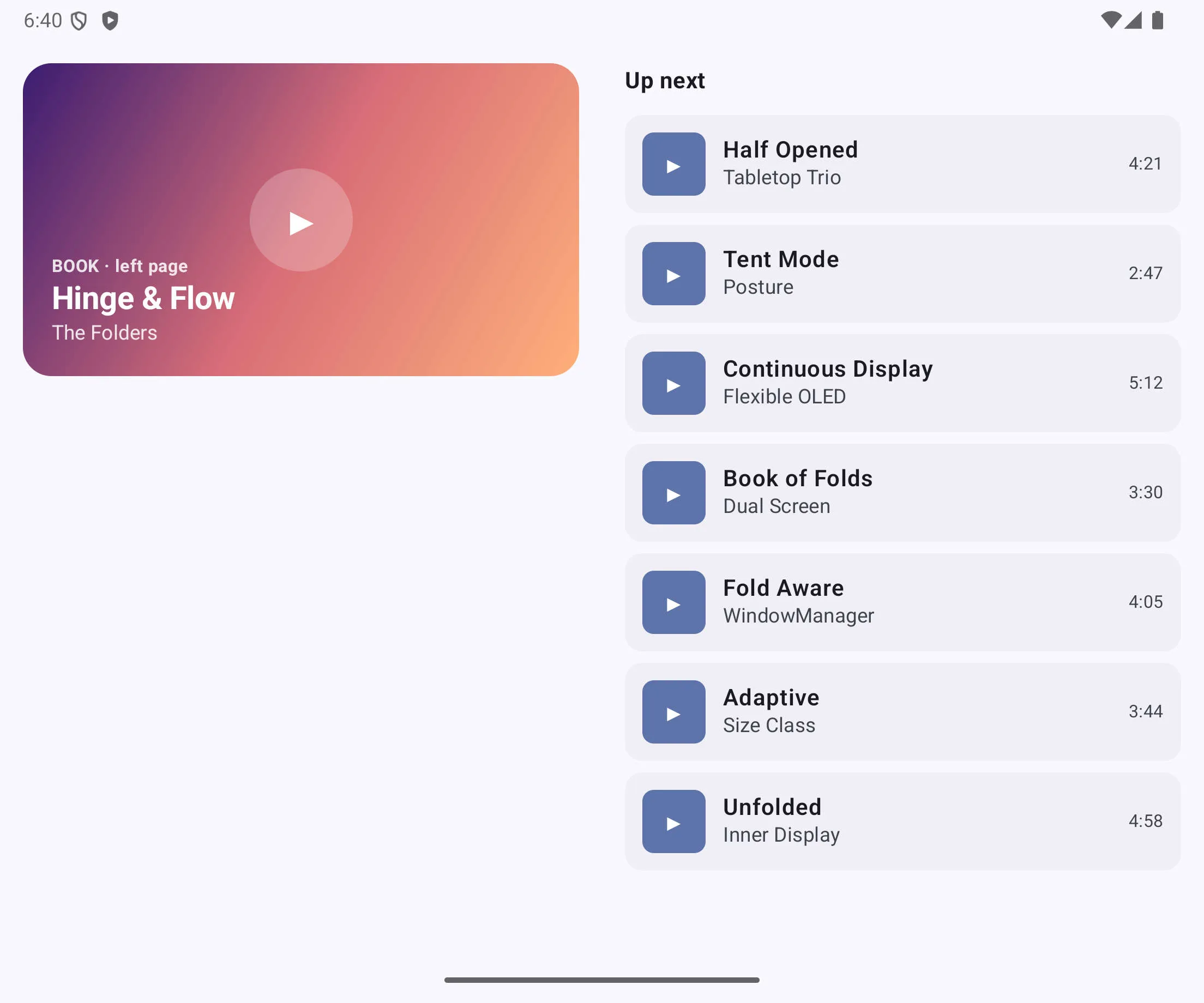Book posture with player on the left page and playlist on the right