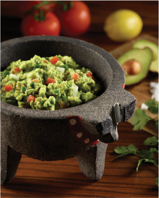 Made to order guacamole in a molcajete