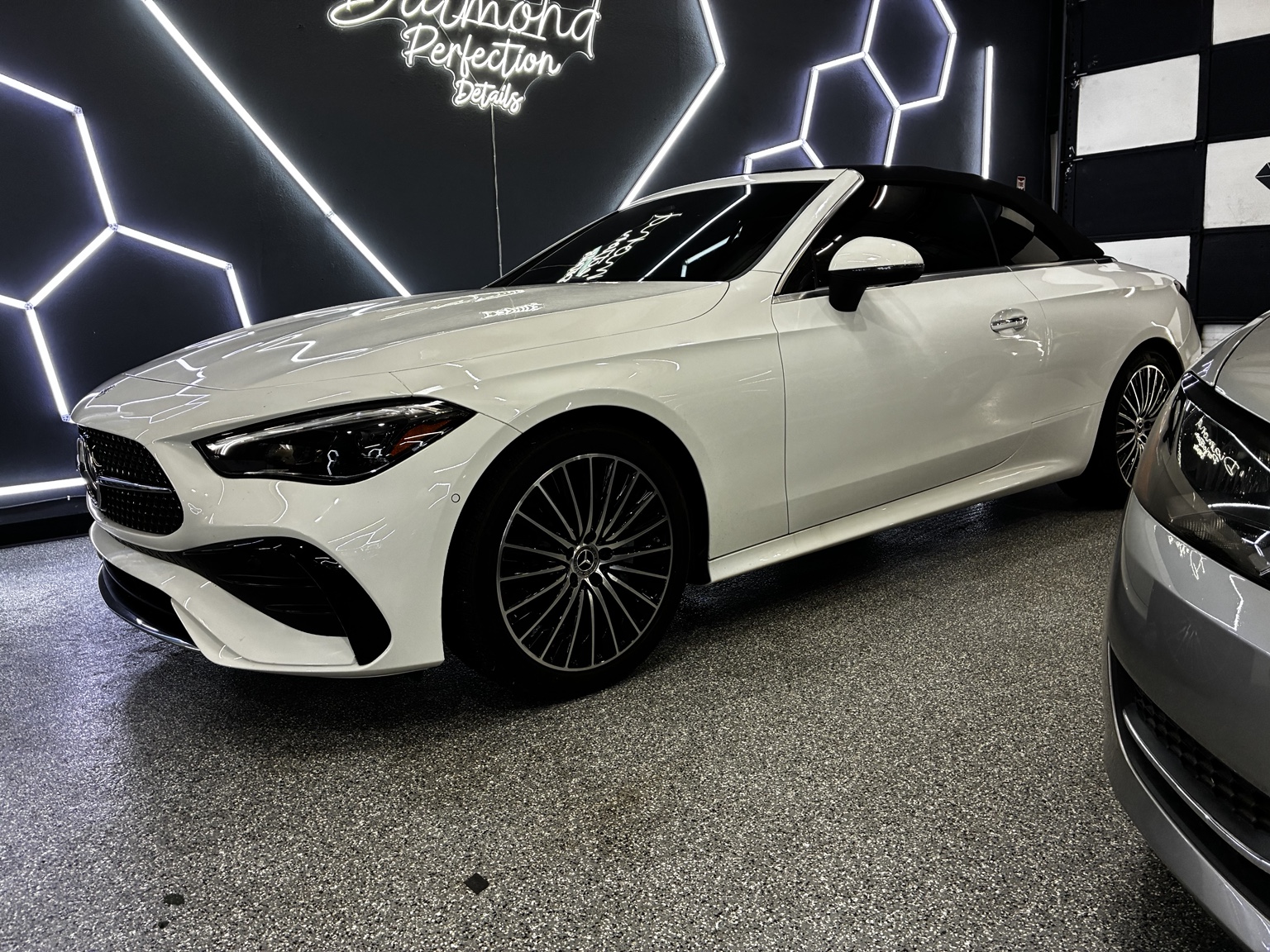 White Mercedes-Benz coupe with ceramic window tint photographed after installation in Phoenix, Arizona