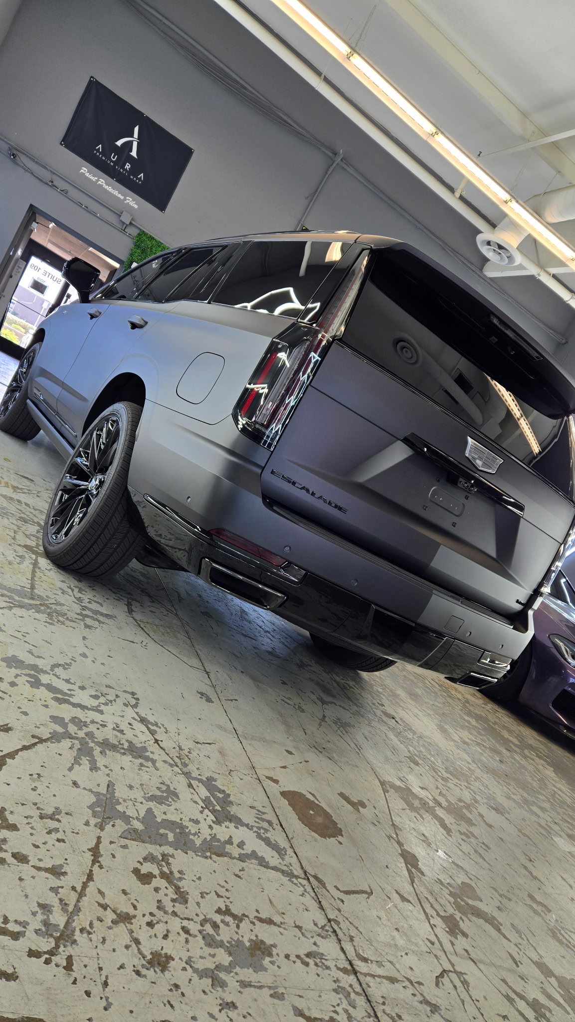 Cadillac Escalade photographed from the rear after paint protection film installation in Phoenix, Arizona
