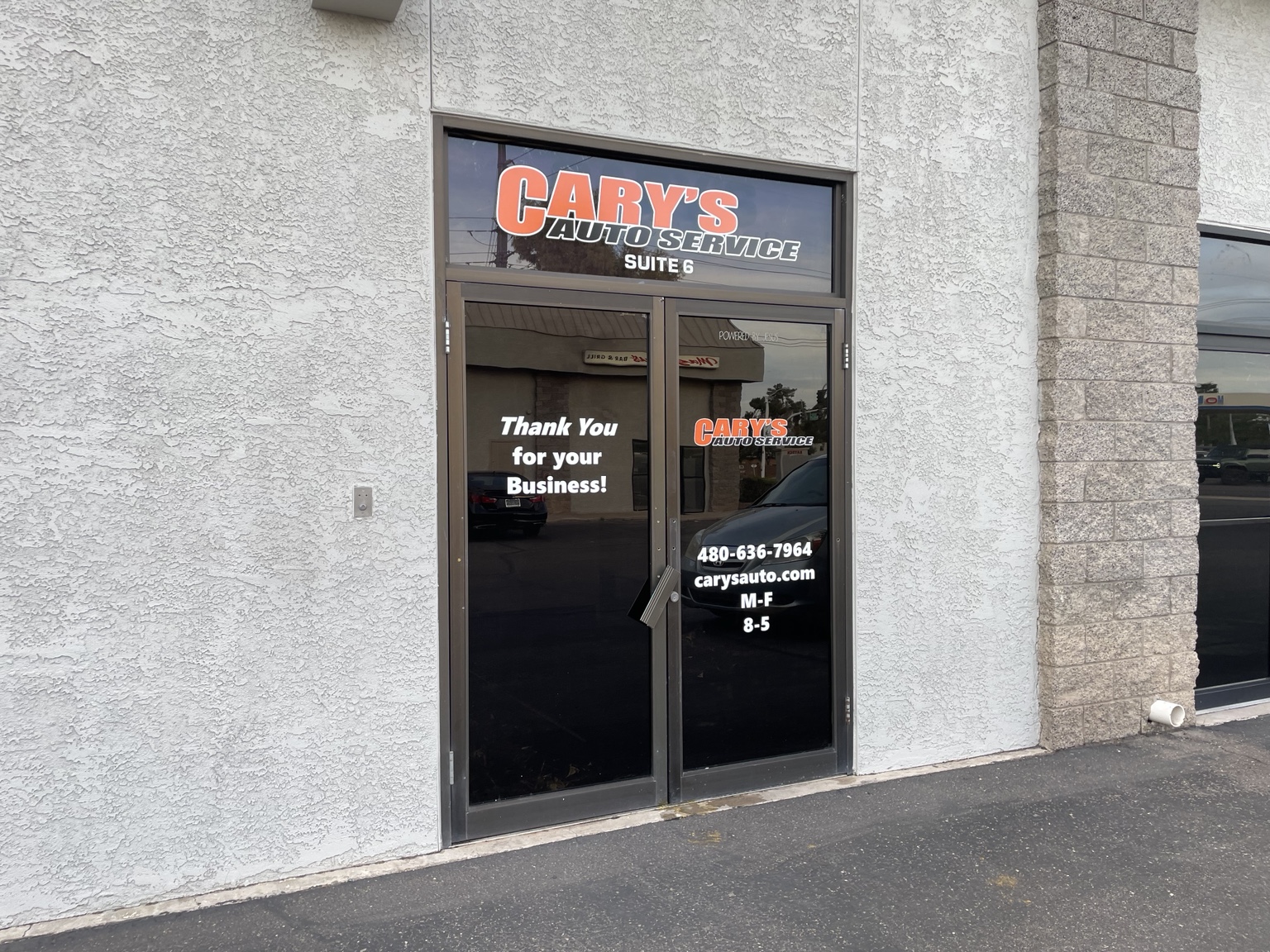 Commercial storefront glass with solar control window film installed